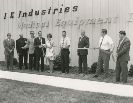 cutting ribbon at versailles plant
