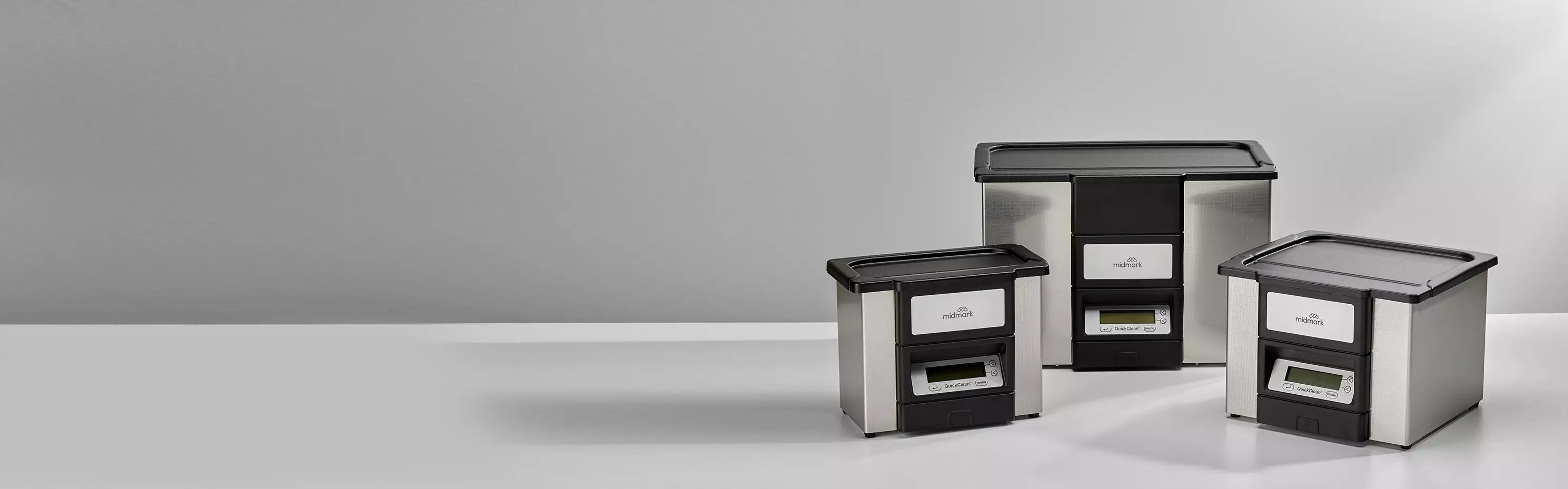 three midmark ultrasonic cleaners