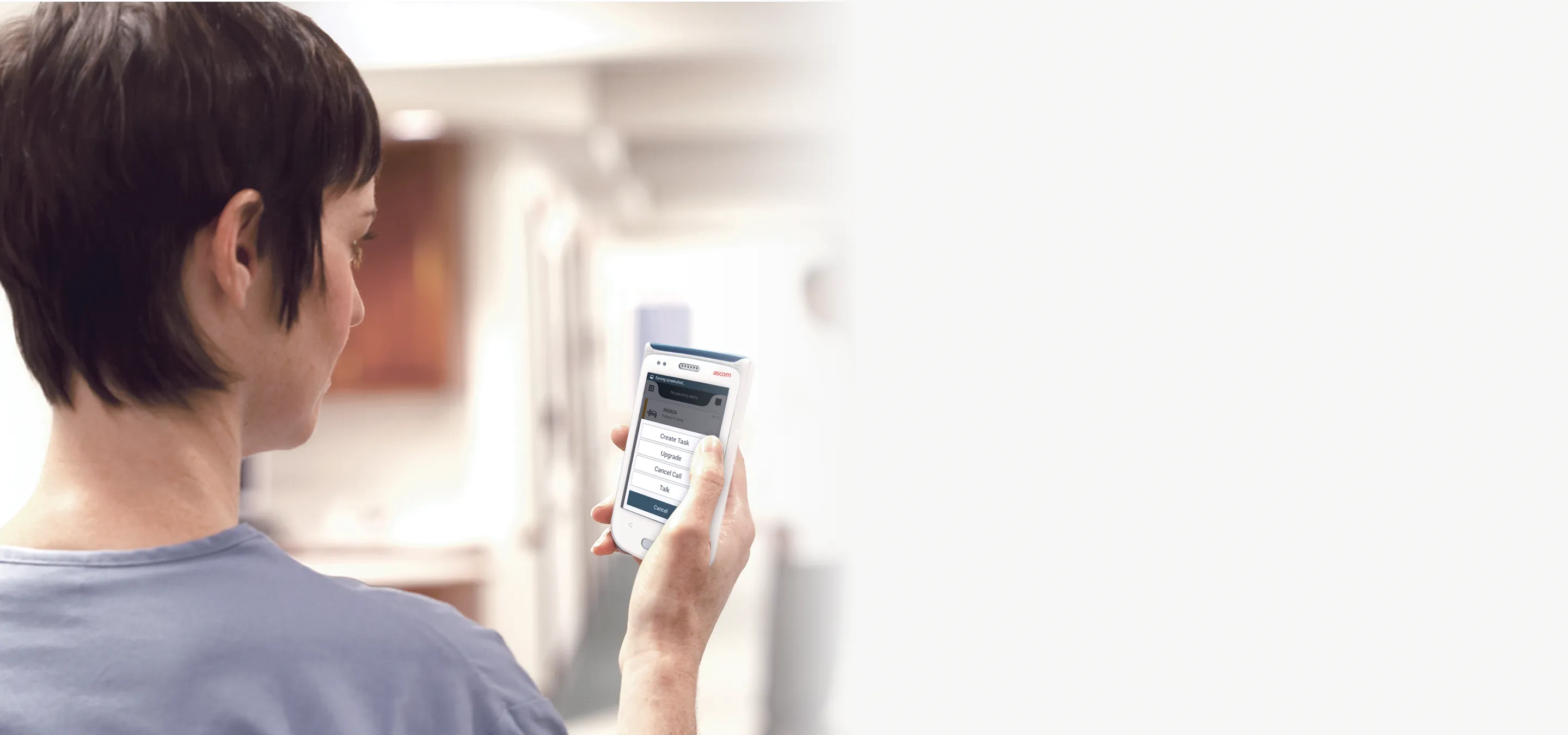 nurse looking at rtls notifications