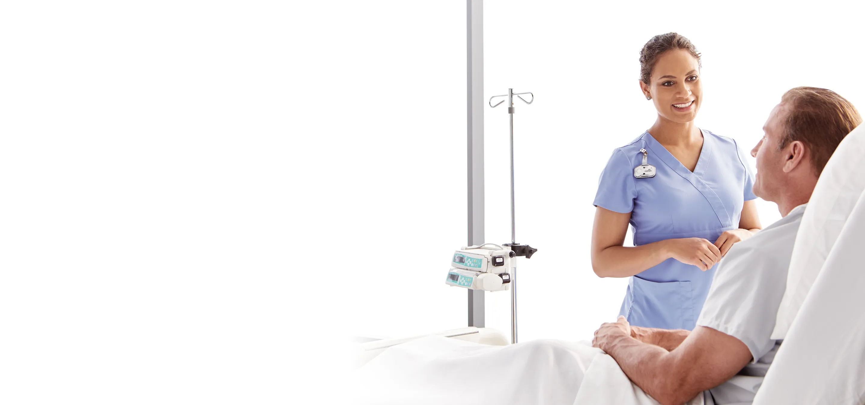 nurse helping patient with iv
