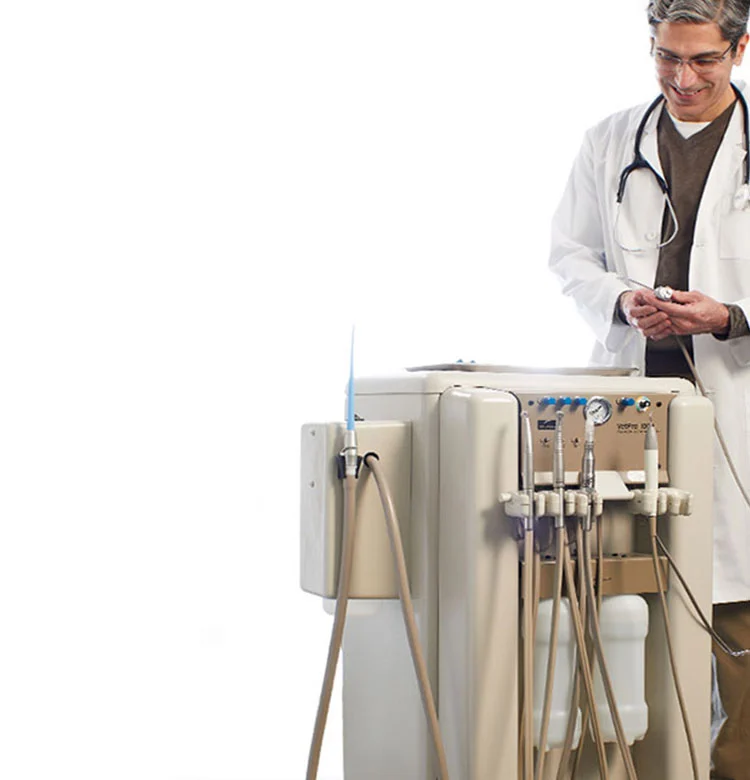dentist using midmark dental equipment