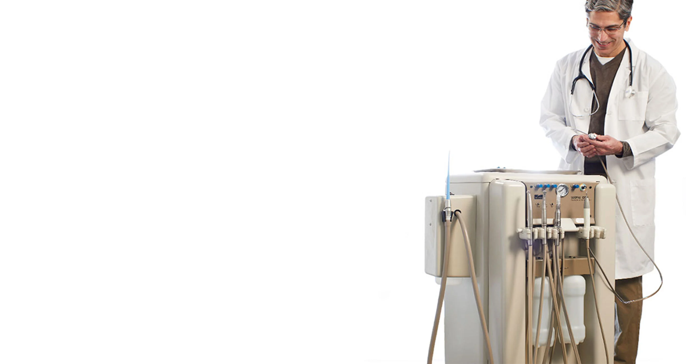 dentist using midmark dental equipment