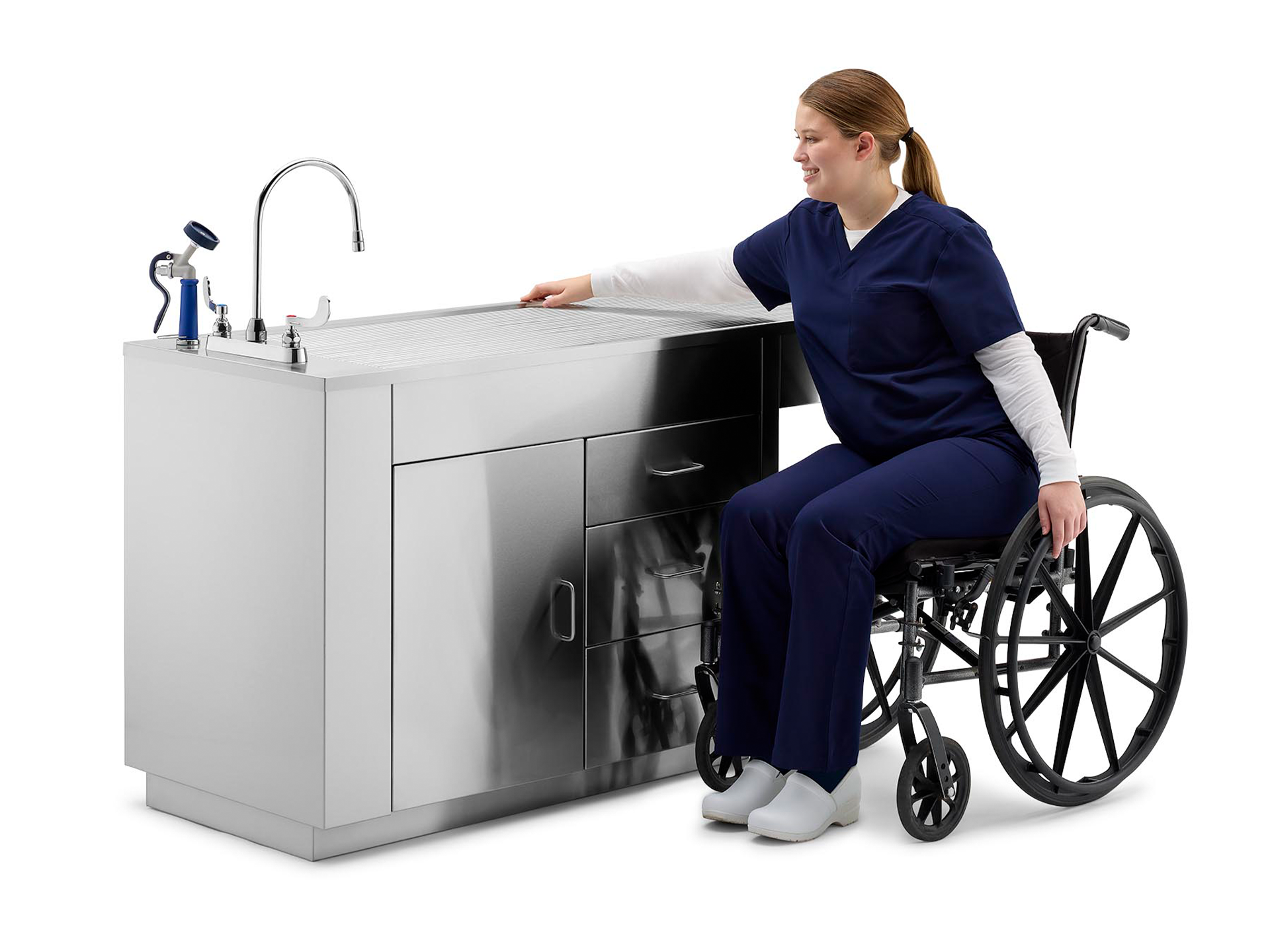 Woman in a wheelchair using Midmark ADA fixed-height treatment table