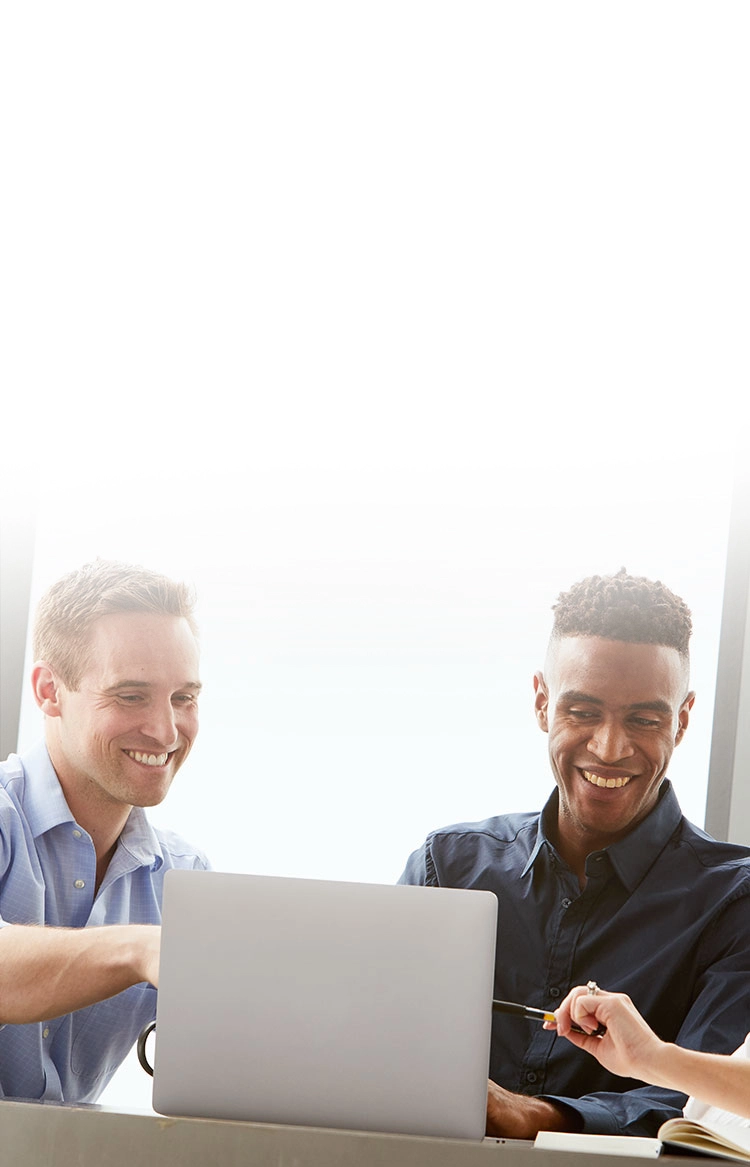 3 people looking at laptop