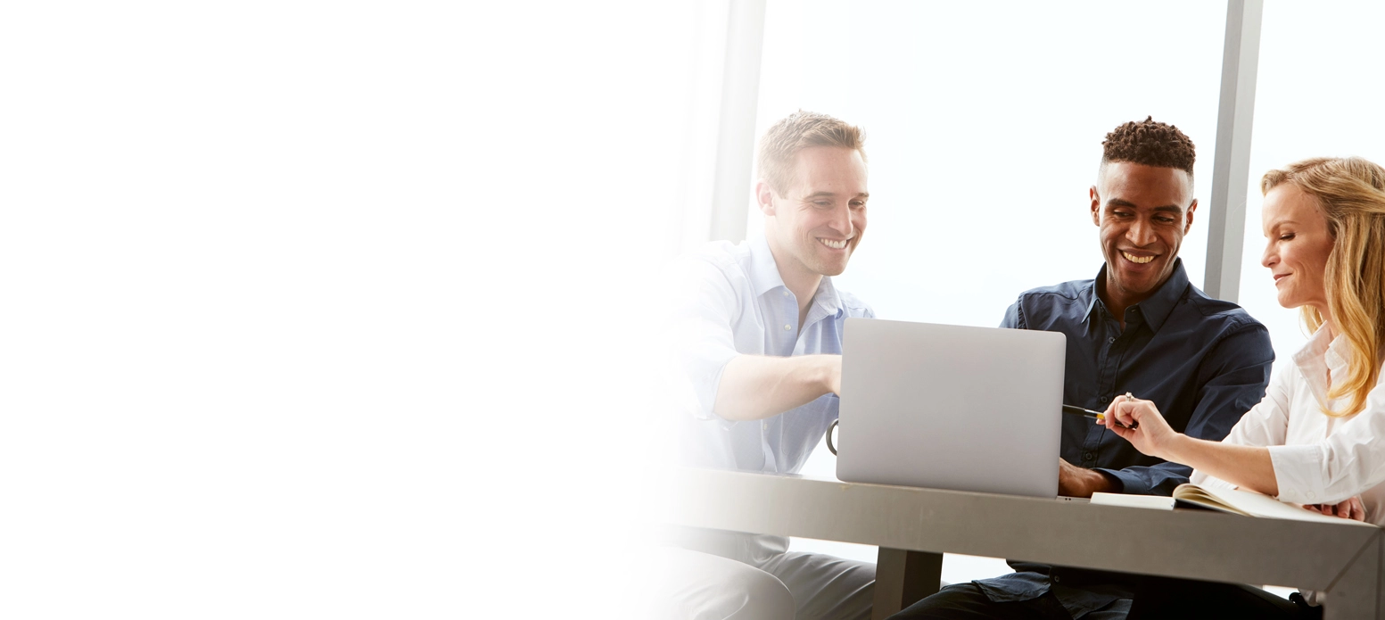 3 people looking at laptop