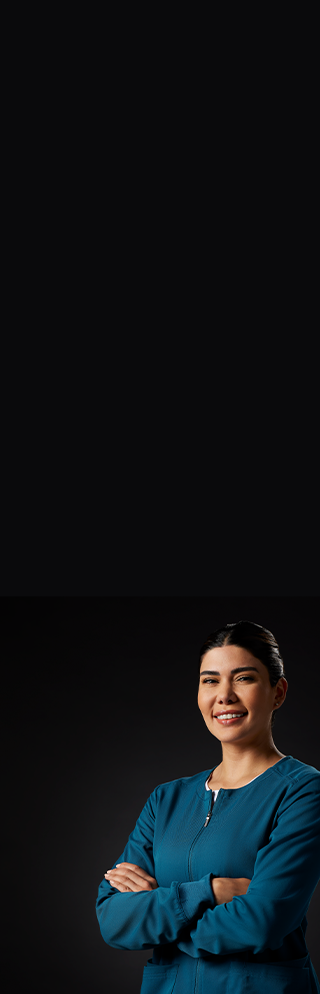 Woman with arms crossed and smiling