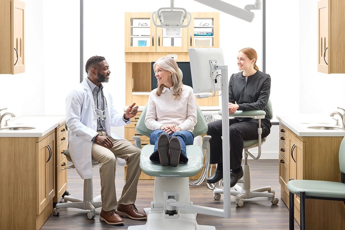 Dental operatory featuring coordinated clinical-grade cabinetry designed to create a welcoming and professional environment