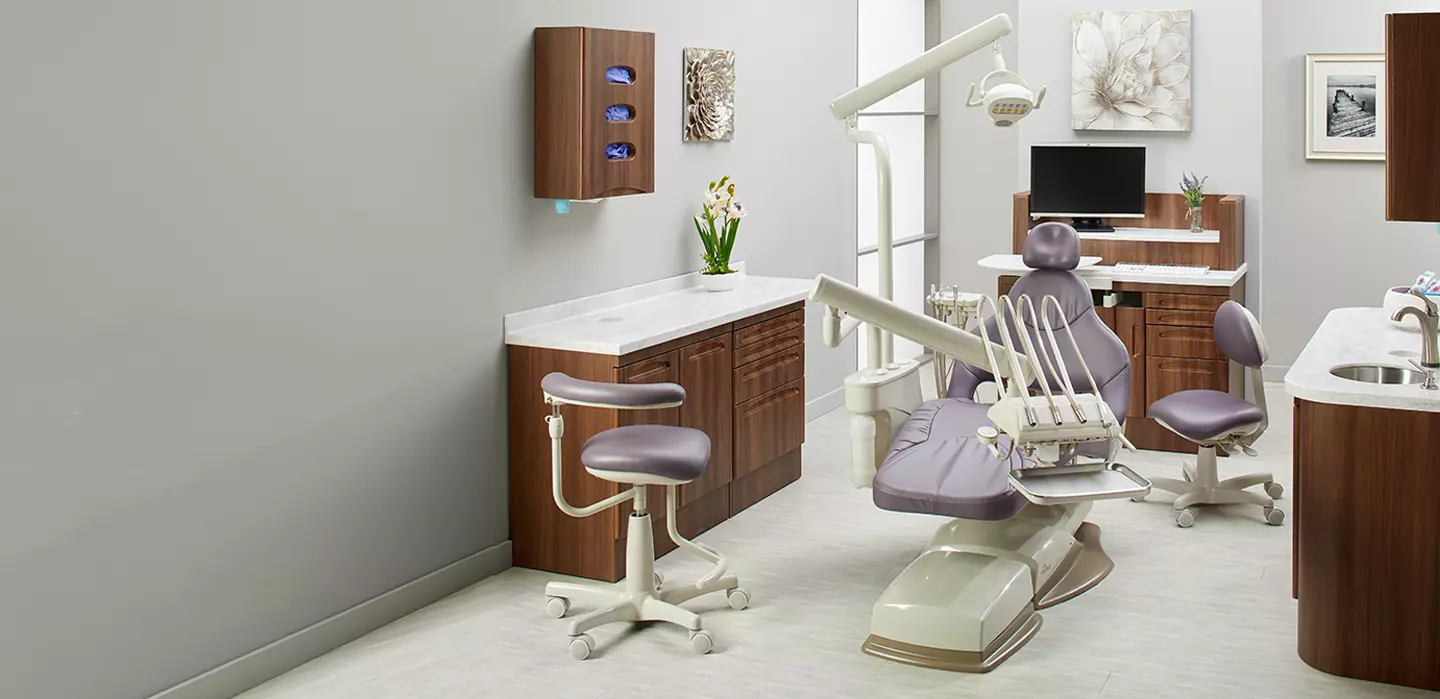 dentist office setup with midmark cabinets and dental equipment