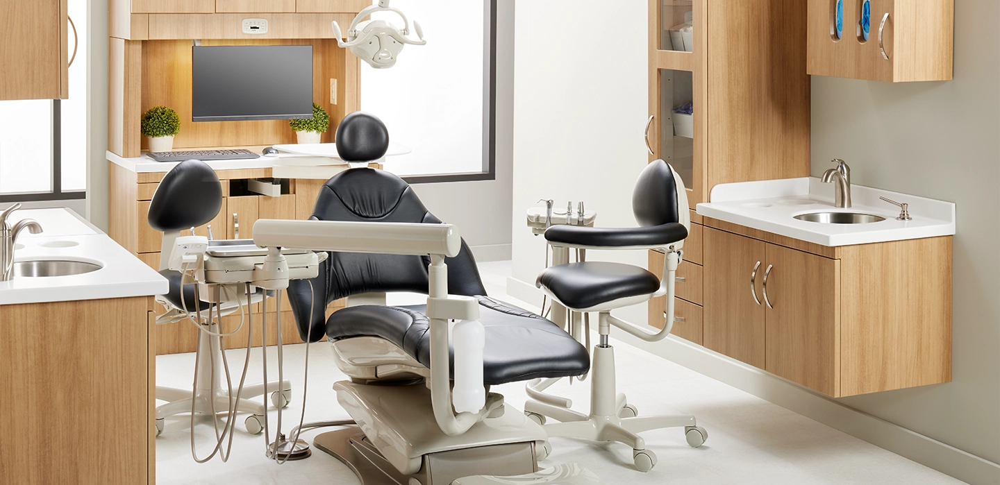 dentist office setup with midmark cabinets and dental equipment