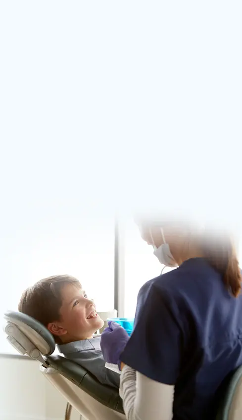 dentist helping patient
