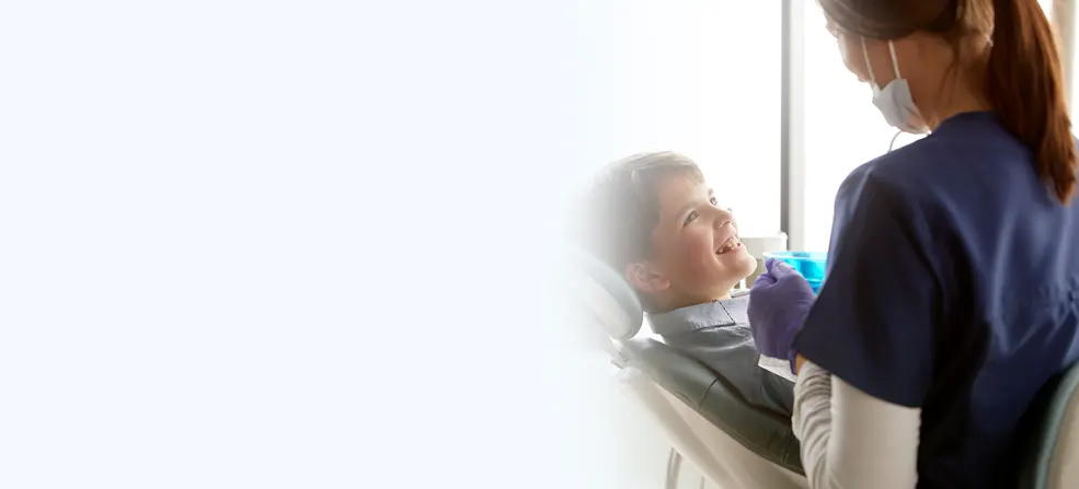 dentist helping patient