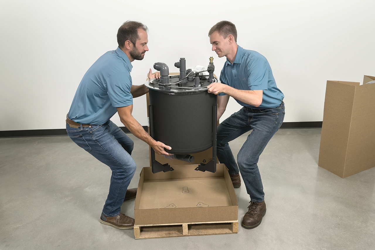 Midmark employee unpacking 626 exam chair for installation