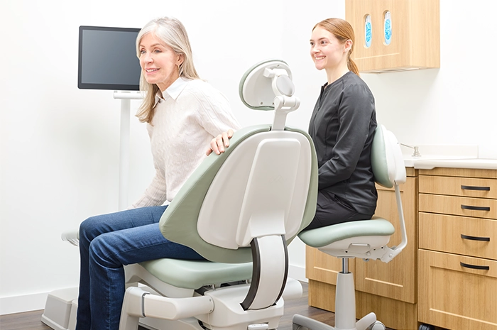 ProductPage-MidmarkDentalChair-img11-angled-right-mid-level-chair-with-monitor