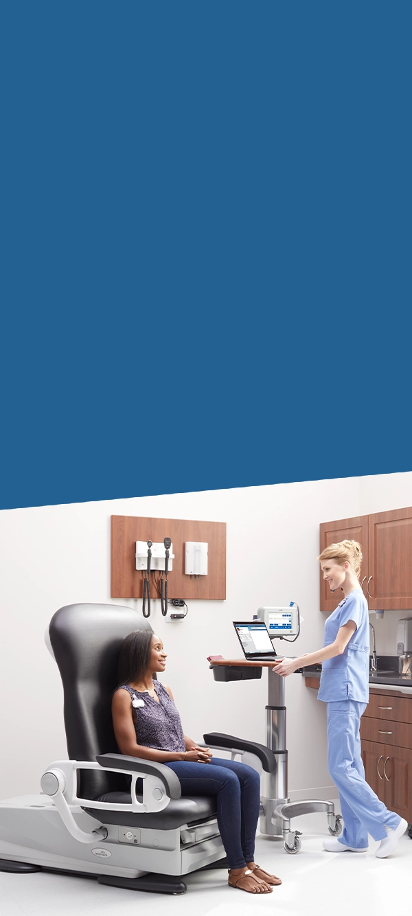 MA talking with patient about the recorded data