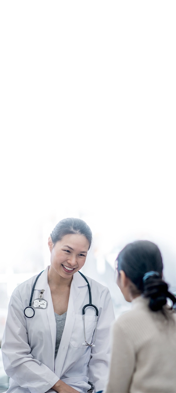 Doctor smiling with patient