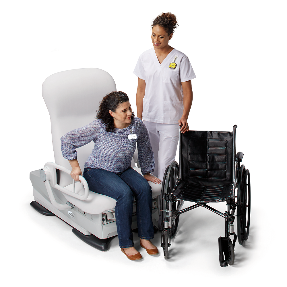 Patient in wheelchair transferring into the Midmark 626