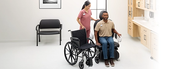 Patient sitting in accessible Midmark 631 procedure chair