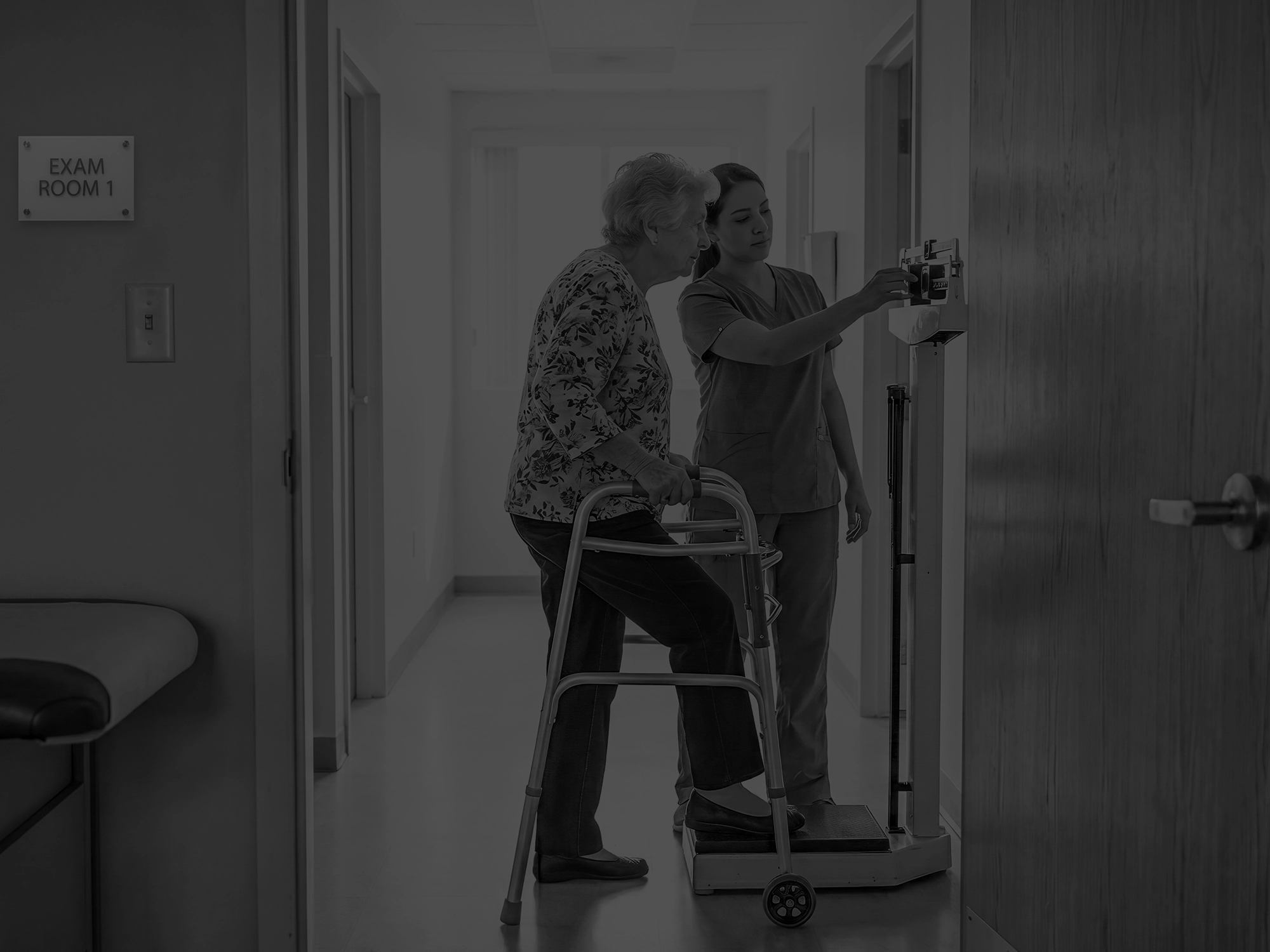 MA taking patient's weight outside of the exam room