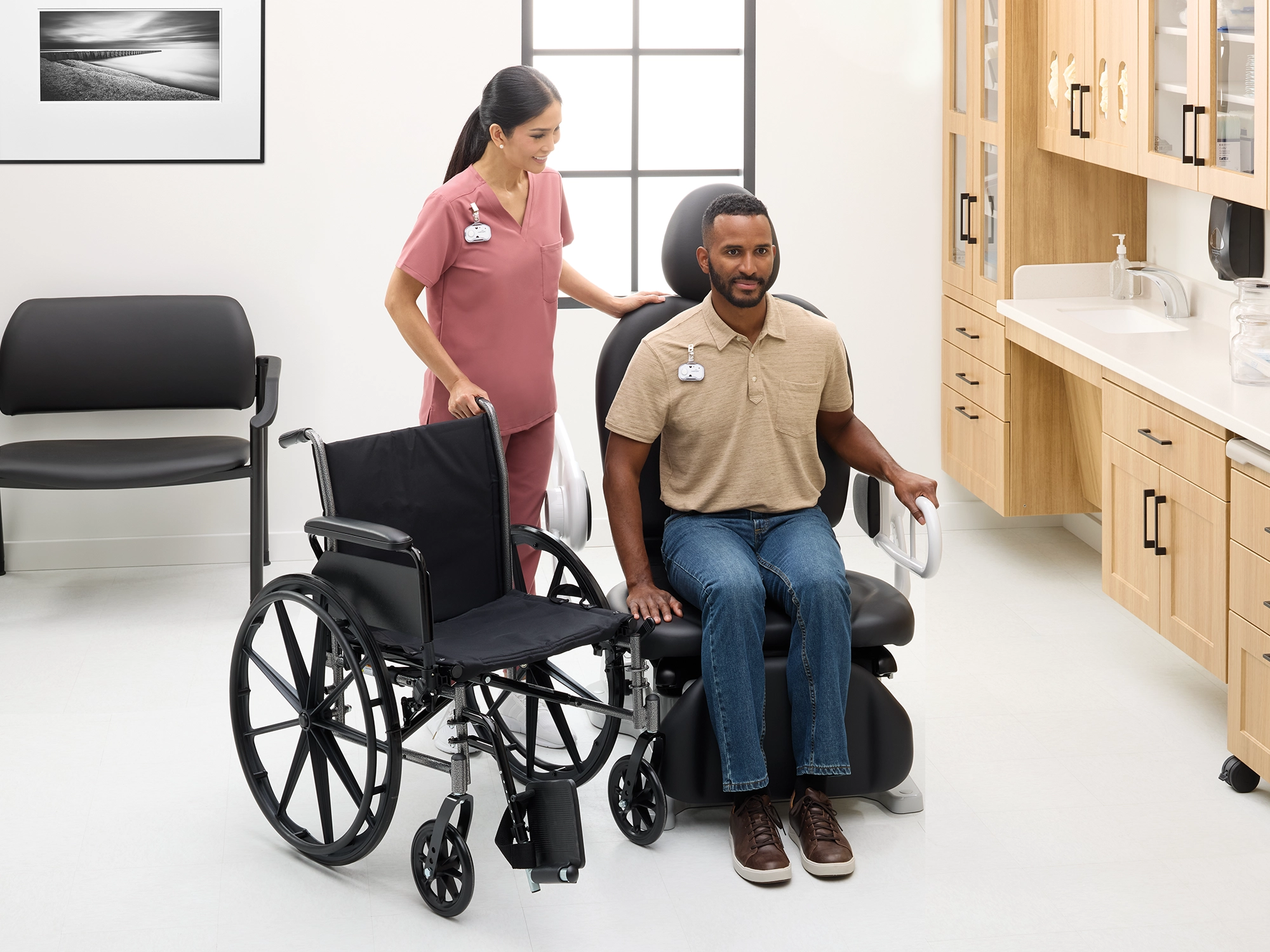 Patient sitting in accessible Midmark 631 procedure chair