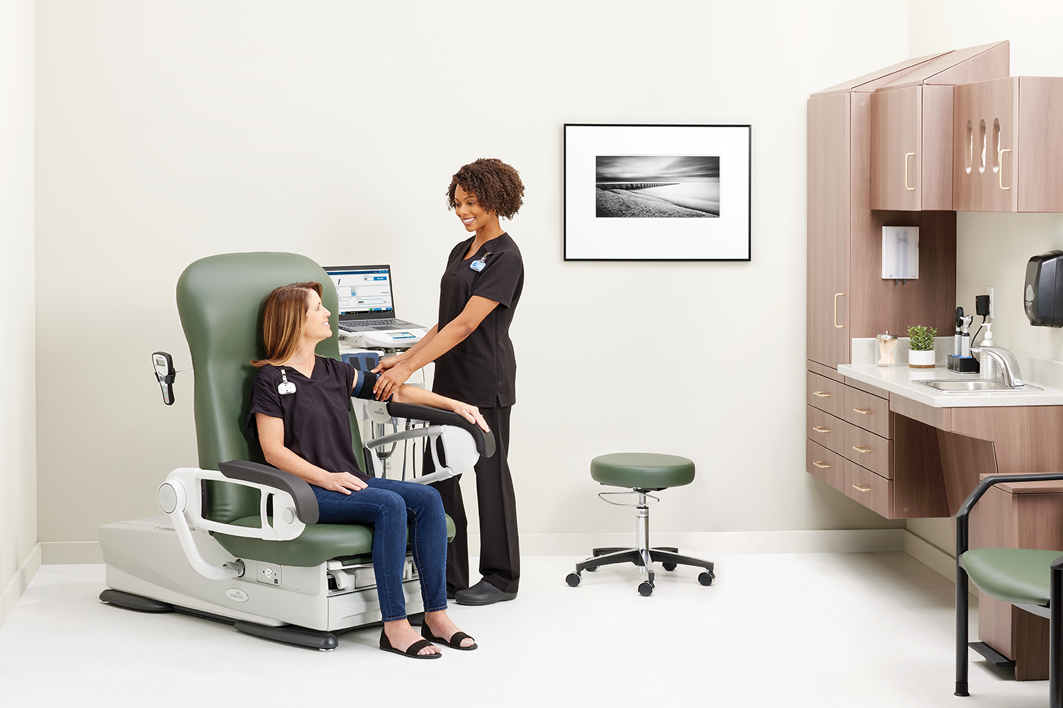 Rendering of a nurse and patient in a vital signs workflow