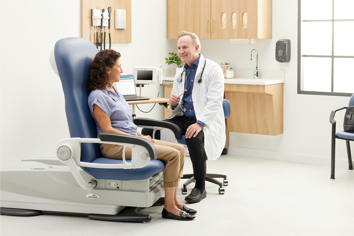 Doctor speaking with patient