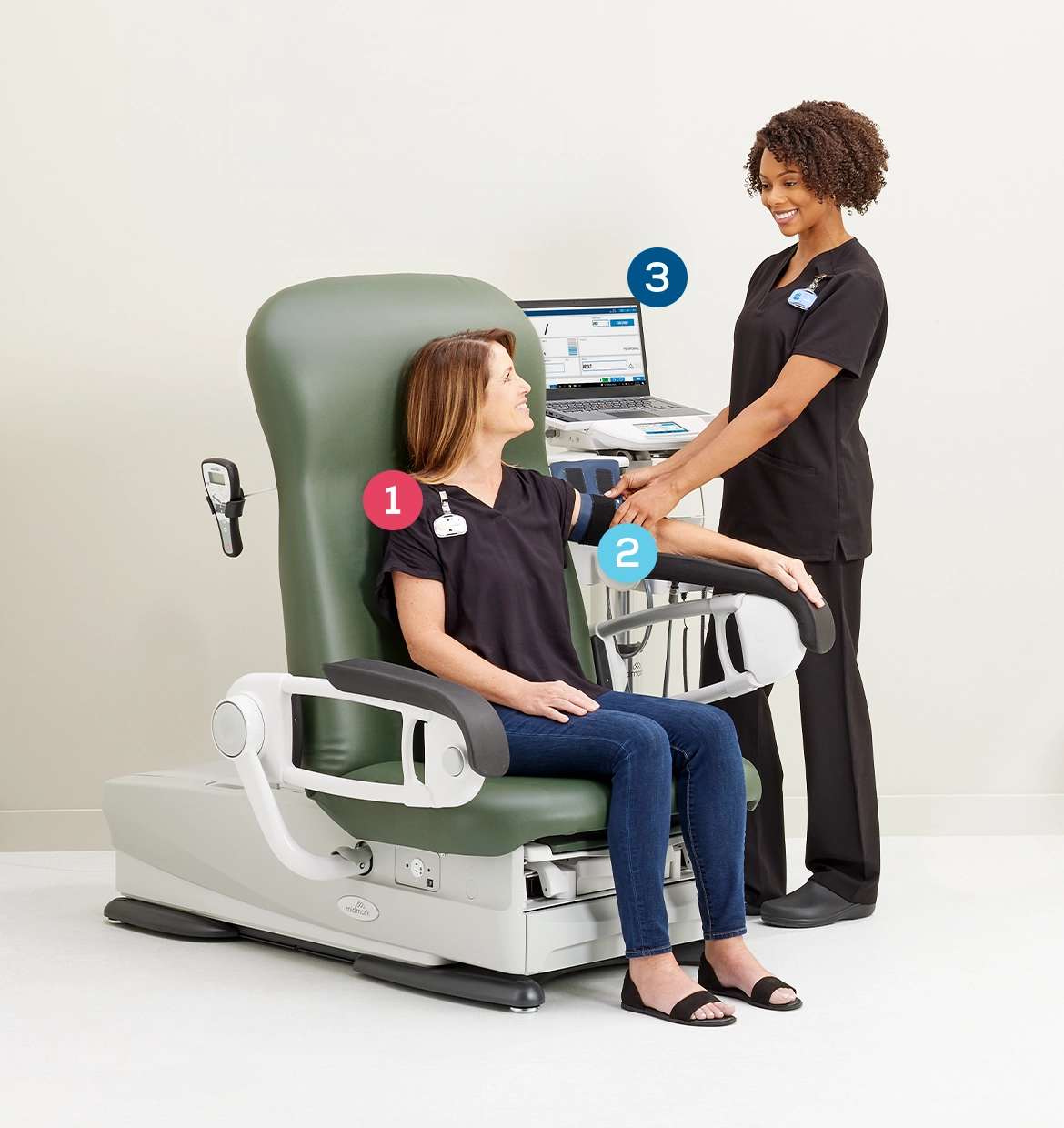 MA taking patients blood pressure