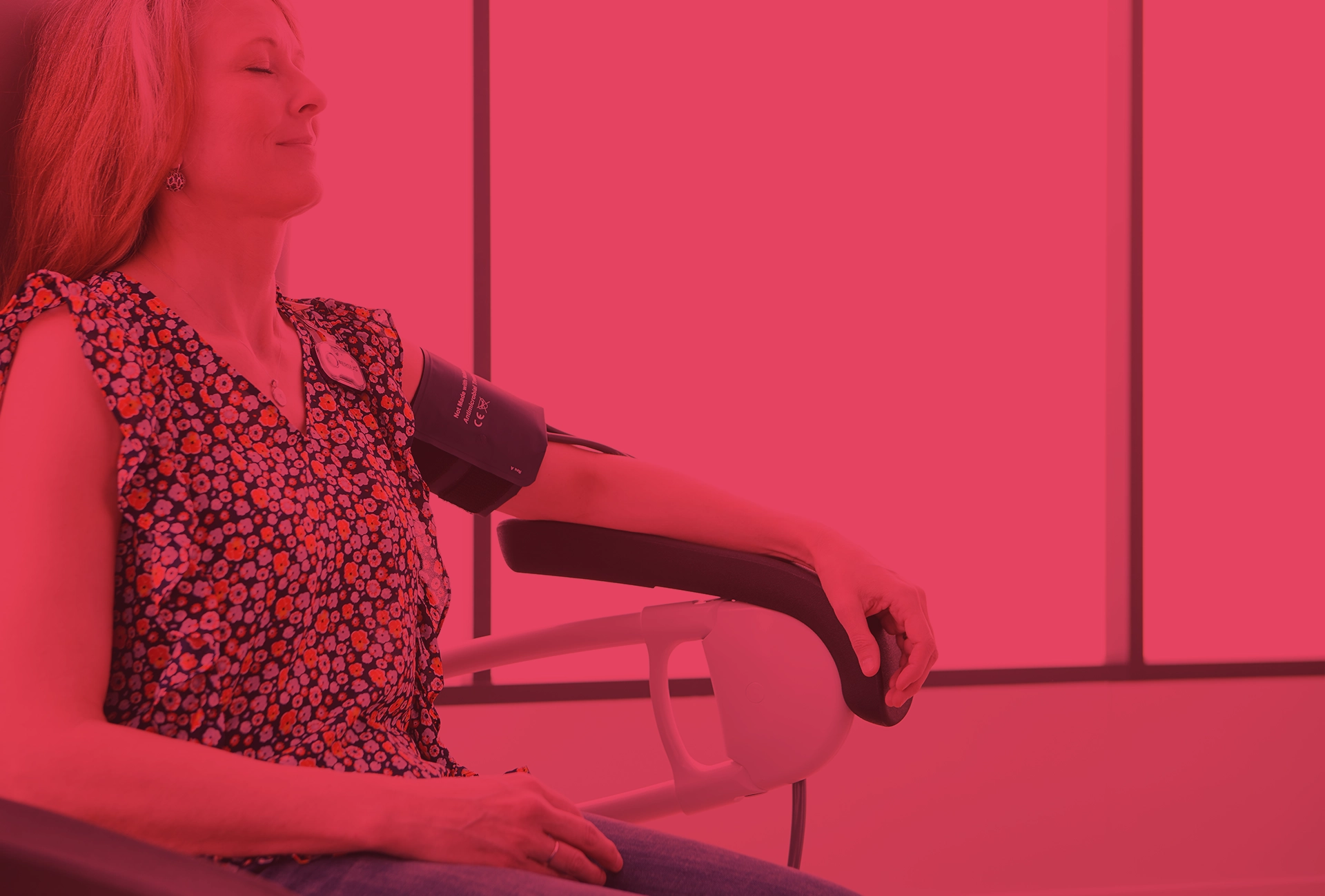 Patient getting her blood pressure taken