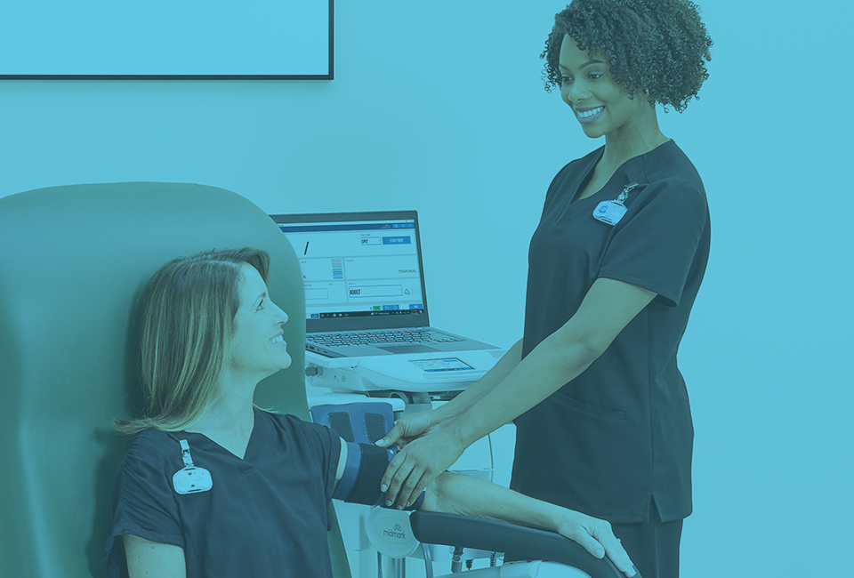 MA wrapping BP cuff on patients arm