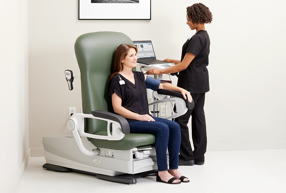 MA taking vitals of patient using IQVitals Zone