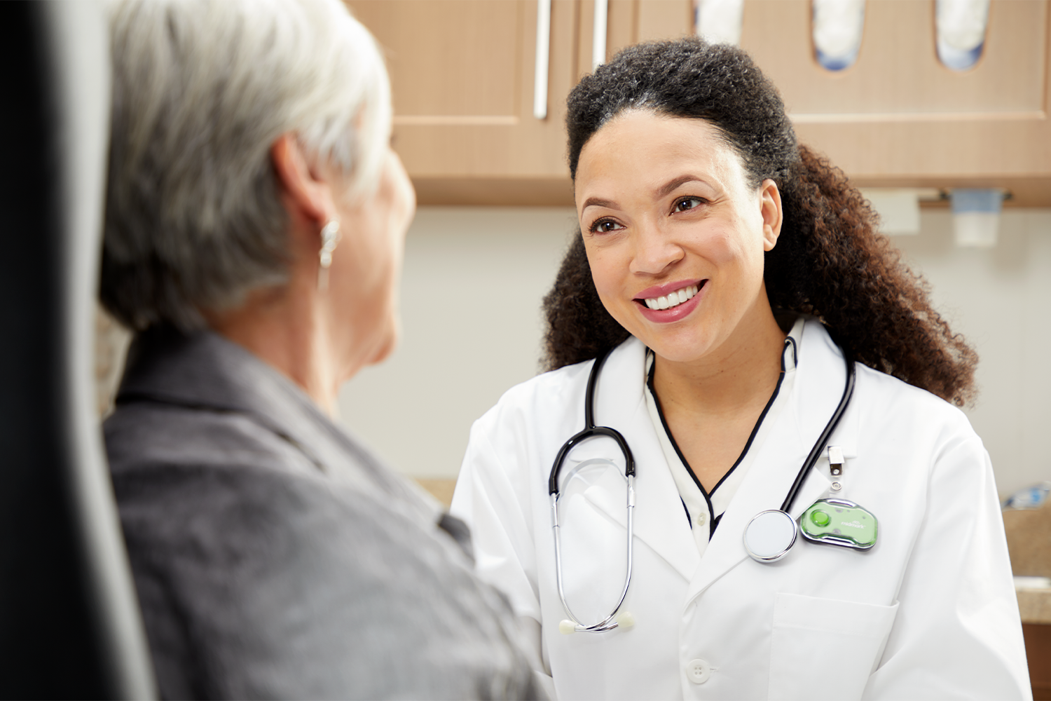 Doctor speaking with patient