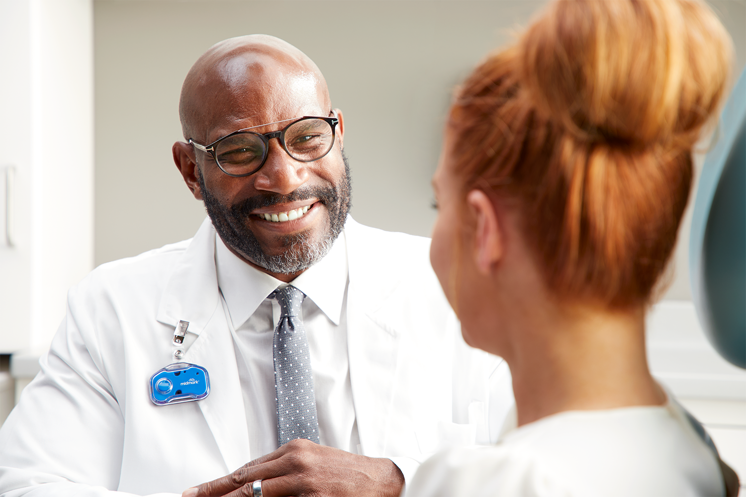 Doctor speaking with patient